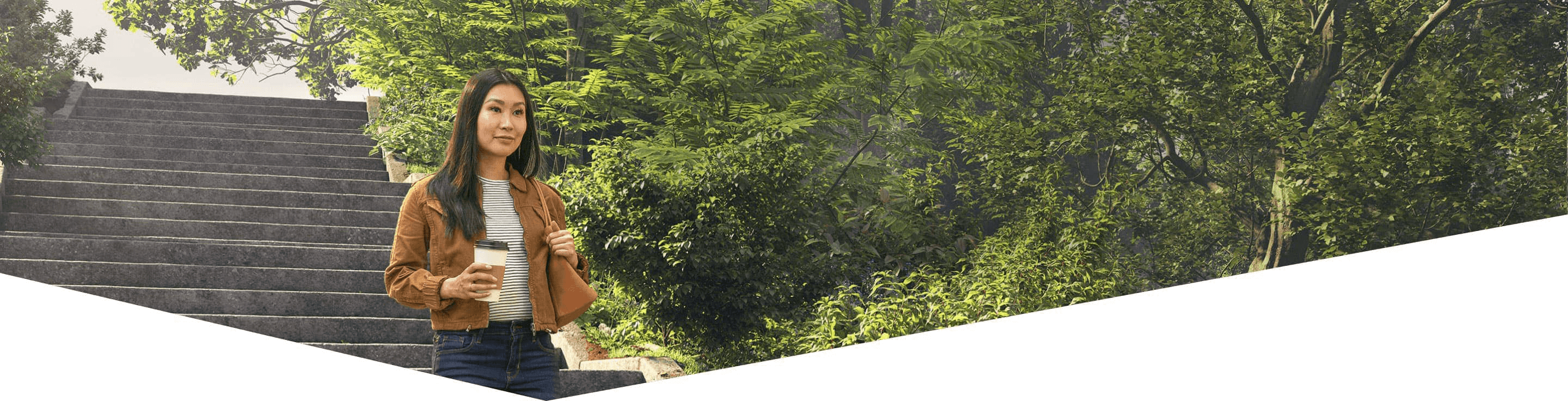 Woman walking down stairs outdoors